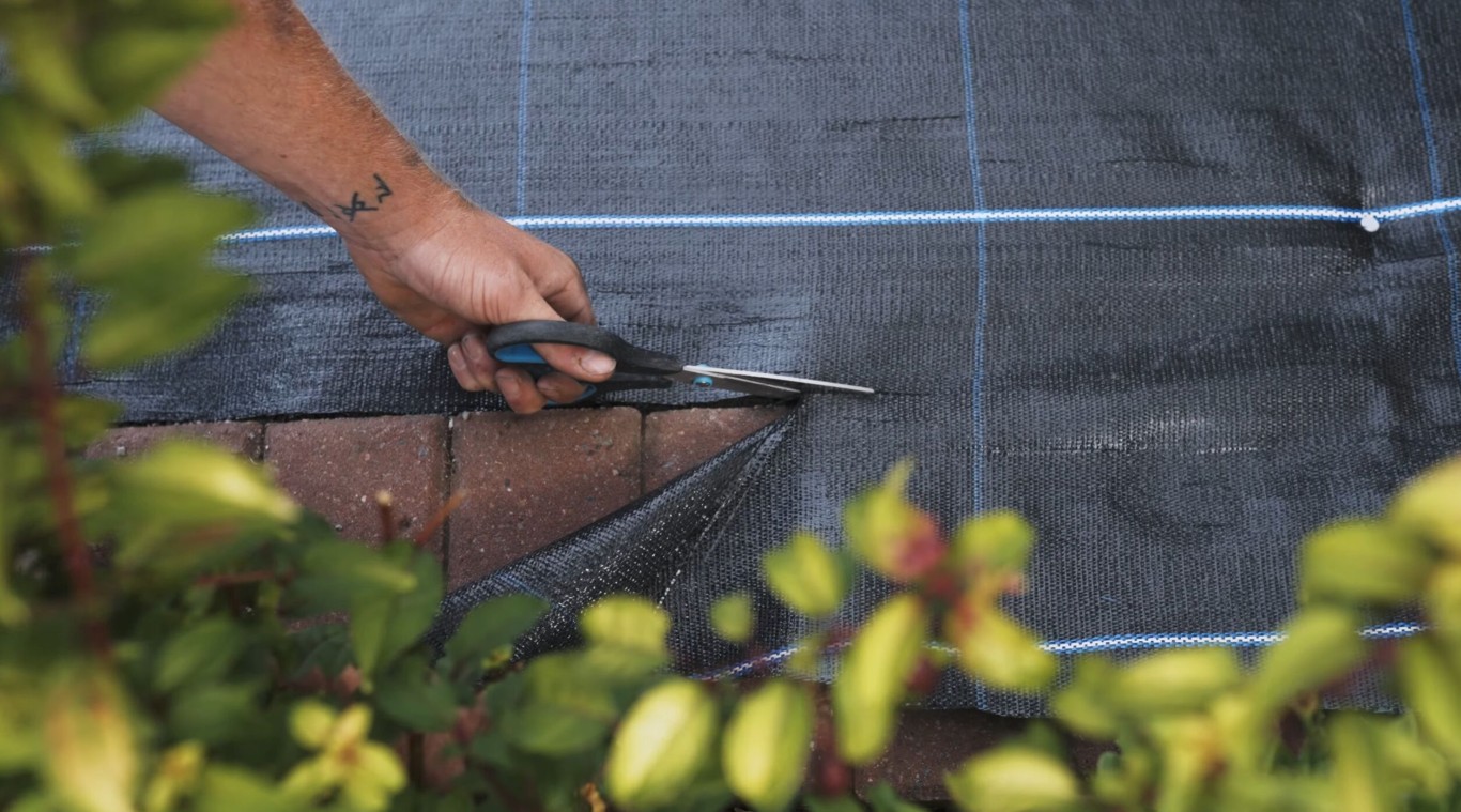 Professional cutting and fitting of safety turf for playground in Southaven, MS